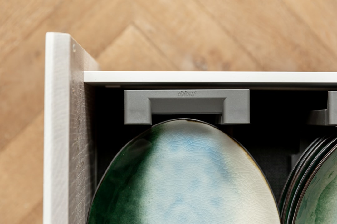 Plates in plates carrier inside a kitchen drawer